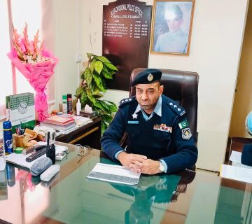 Pakistan's Police officer Khalid Awan in his office