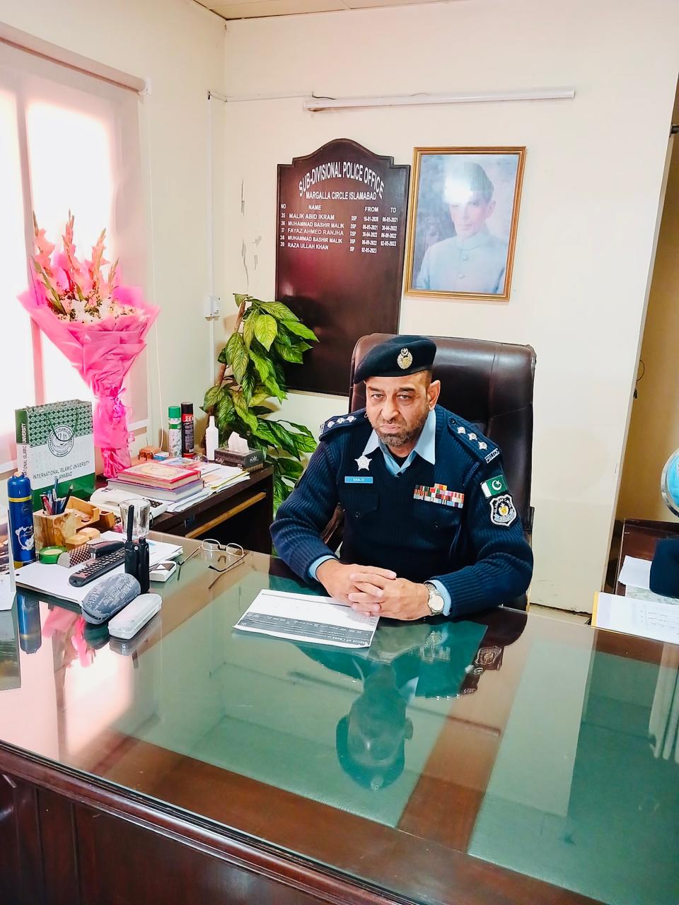 Pakistan's Police officer Khalid Awan in his office