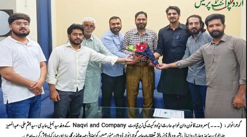 Khawaja Haris Advocate and the delegation of Naqvi and Company presenting a bouquet to Director Public Relations Munawar Hussain.